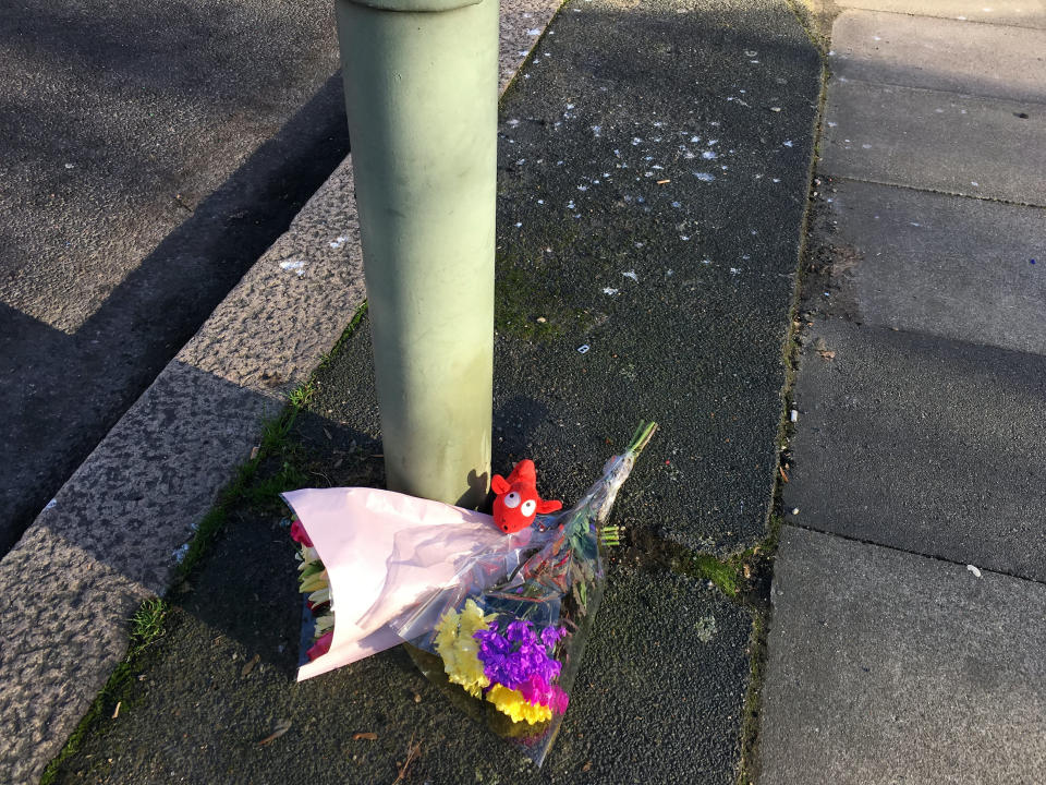 Flowers left at Croydon Road following the crash that has now claimed the lives of Nicole Newman and her eight-month-old son Luciano. (SWNS)