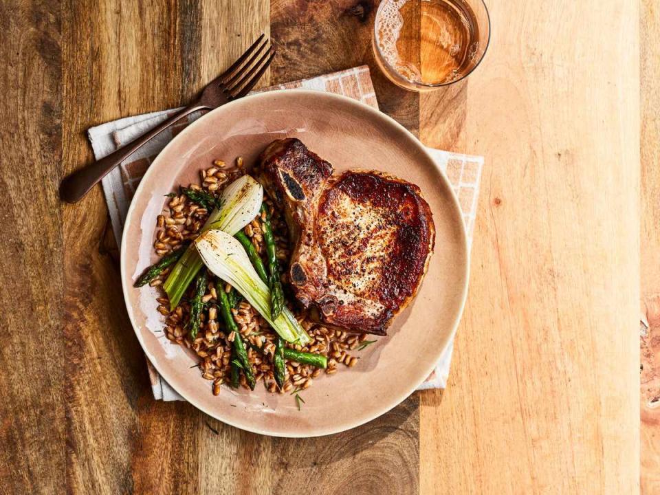 Pork Chops with Spring Onions, Farro, and Asparagus