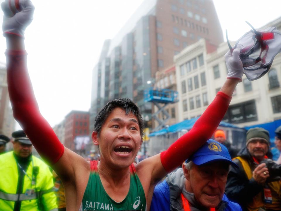 Yuki Kawauchi of Japan celebrates after winning the men's division of the 122nd Boston Marathon in Boston, Massachusetts, U.S., April 16, 2018.