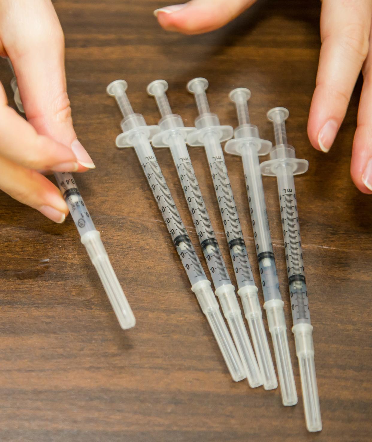 Syringes with the Pfizer COVID-19 vaccine.
