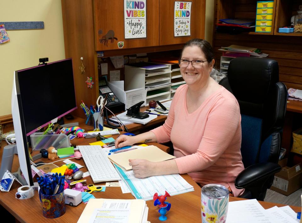 Angel Berry, A Million Dreamz child care center executive director, sits at her desk, Friday, April 12, 2024, in Sheboygan, Wis. Berry has been working on helping area families by expanding the center's hours and capacity in the past few years.