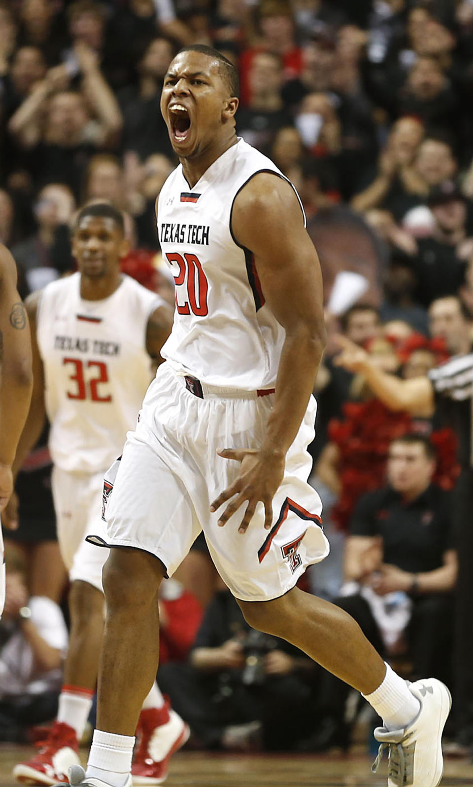 Texas Tech's Toddrick Gotcher celebrates in the early moments of their NCAA college basketball game against Oklahoma State in Lubbock, Texas, Saturday, Feb, 8, 2014. (AP Photo/Lubbock Avalanche-Journal, Tori Eichberger) ALL LOCAL TV OUT