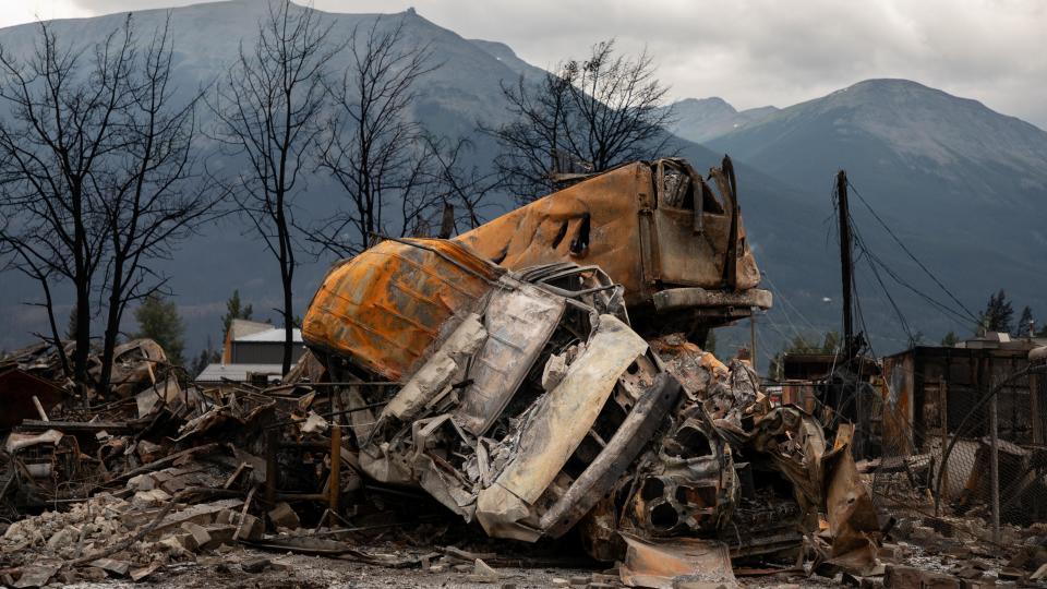 Vehicles wrecked by wildfires in Jasper