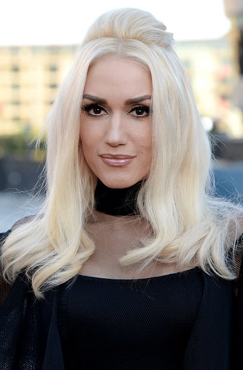 No doubt Stefani pulled off a blonde Morticia Addams at the 2015 American Music Awards in Los Angeles. Her black liquid lined eyes and thick brows made for a fierce look while those bronze lips toned it all down with a simple sexy shimmer.