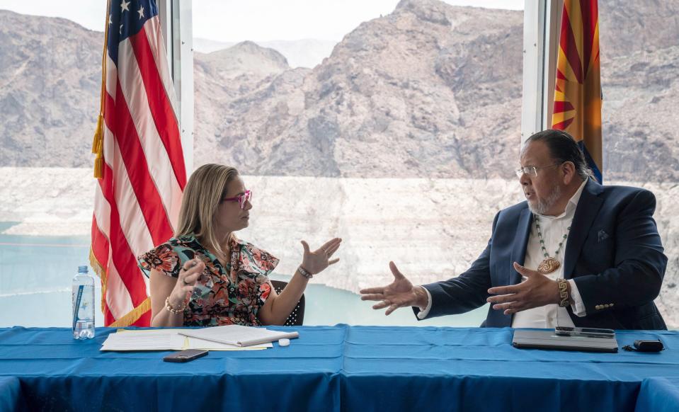 Sen. Kyrsten Sinema, D-Ariz., and Gov. Stephen Roe Lewis (Gila River Indian Community) talk during the Water Advisory Council meeting, Aug. 8, 2022, in the Hoover Dam Spillway House, 75 Hoover Dam Access Road, Boulder City, Nevada.