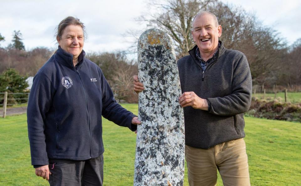 Contractor Stewart Lambie and ranger Kate Sampson with the propeller