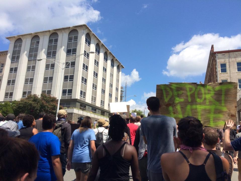 Counter-protestors walk towards the Durham Courthouse in response to a proposed KKK rally on Friday.