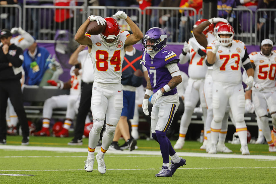 Kansas City Chiefs wide receiver Justin Watson (84) reacts in front of Minnesota Vikings cornerback Byron Murphy Jr. (7) after catching a pass during the second half of an NFL football game, Sunday, Oct. 8, 2023, in Minneapolis. (AP Photo/Bruce Kluckhohn)