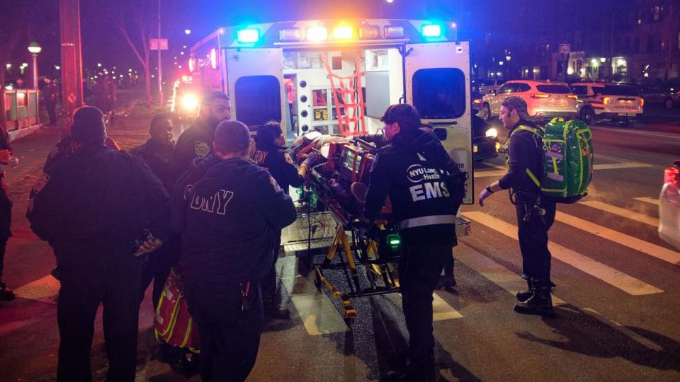 PHOTO: Medics remove a shooting victim from the Franklin Avenue - Eastern Parkway subway station in Brooklyn, New York City, Jan. 14, 2024.     (Gardiner Anderson/NY Daily News via Getty Images)