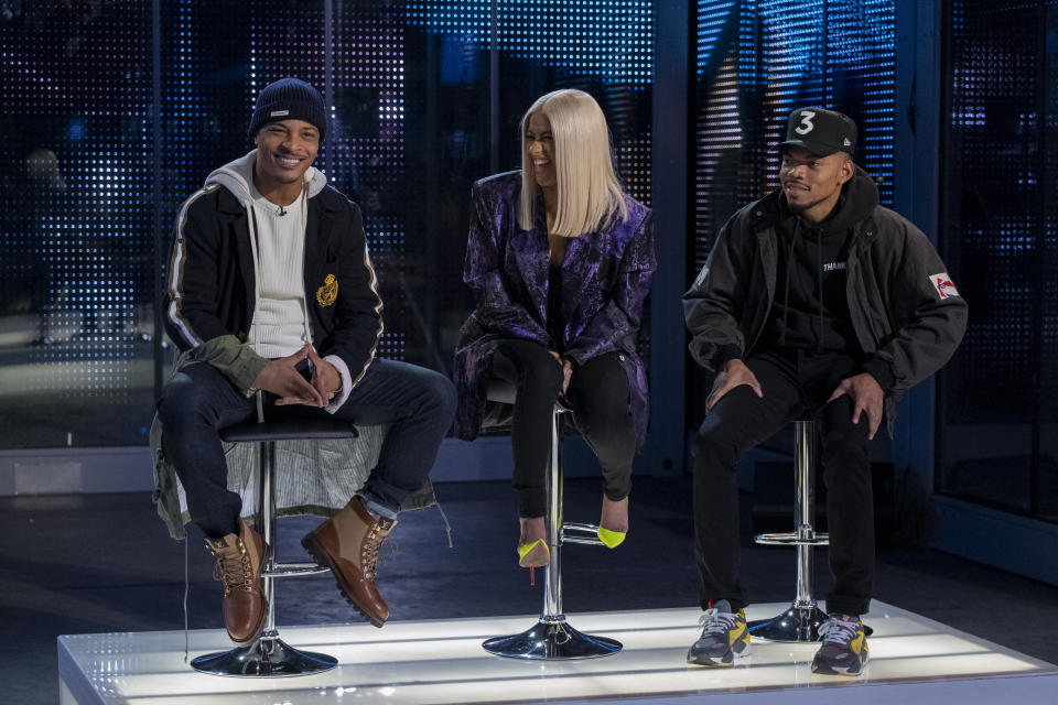 This image released by Netflix shows, from left, rappers T.I., Cardi B and Chance the Rapper from the competition series, "Rhythm + Flow." (Adam Rose/Netflix via AP)