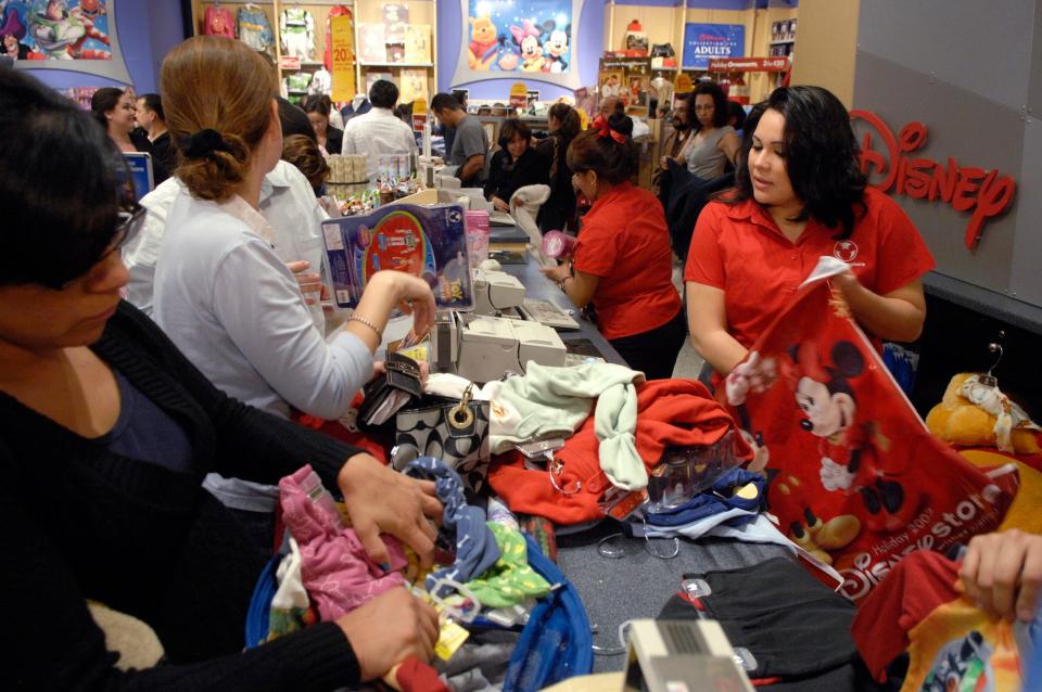 Shoppers at the Disney Store in Glendale, California, on November 23, 2007.