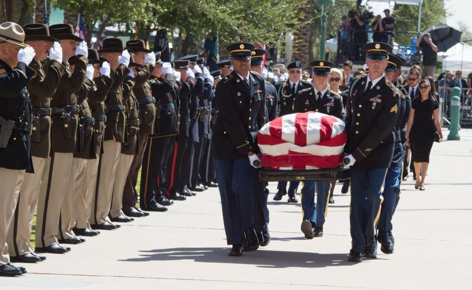 34) John McCain's wife, Cindy McCain, walks in the processional from her husband's private memorial service on August 29