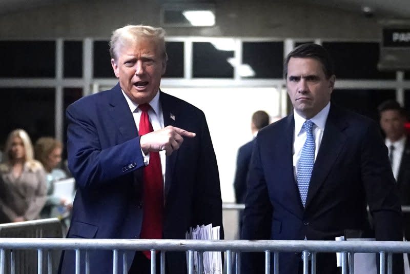 Former President Donald Trump speaks to reporters as he leaves his criminal trial at Manhattan Criminal Court in New York on Tuesday. Pool Photo by Timothy A. Clary/UPI