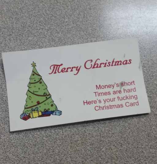 The Christmas card is the size of a business card and reads "Money's short, times are hard, here's your fucking Christmas card"