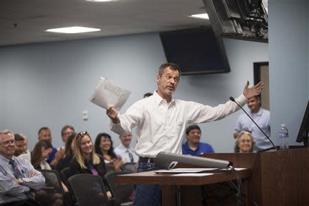 Charlie Steak addresses the Arizona Corporations Commission in Phoenix November 13, 2013. REUTERS/Samantha Sais