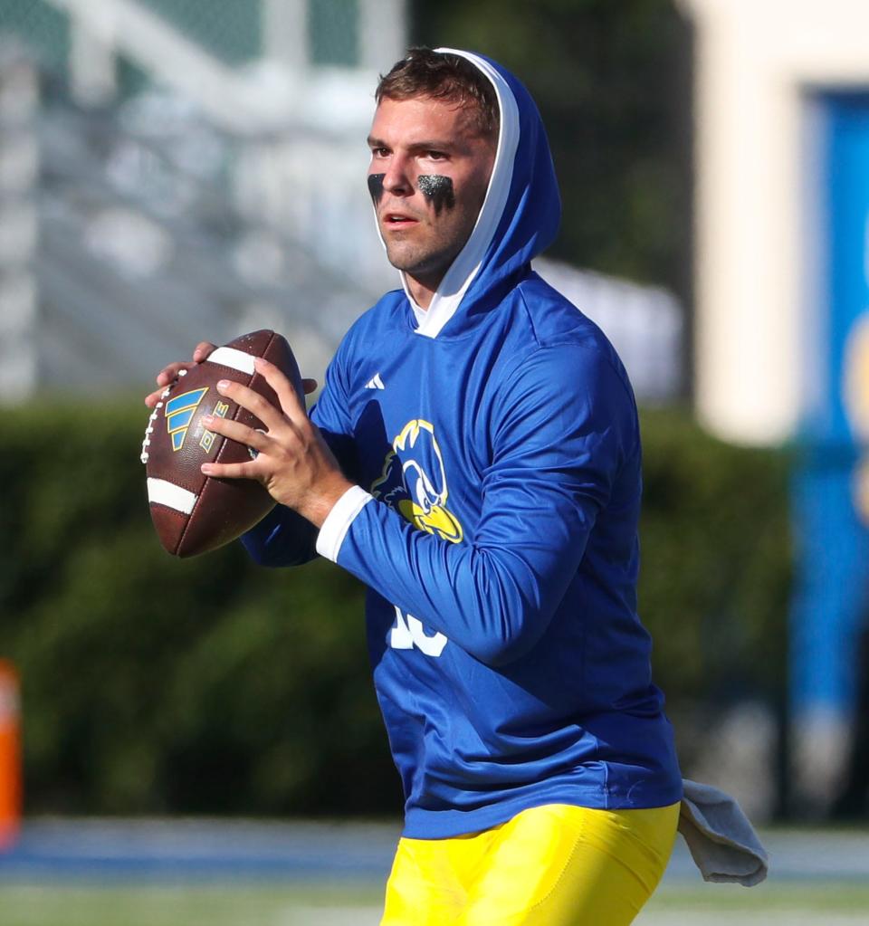 Delaware backup quarterback Dan Lipovski warms up before the Blue Hens take on St. Francis at Delaware Stadium, Saturday Sept. 16, 2023.