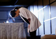 Former women's world number one golfer Ai Miyazato of Japan bows as she leaves a news conference to announce her retirement in Tokyo, Japan May 29, 2017. REUTERS/Issei Kato