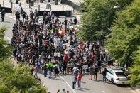 <p>Marchers rally outside Bank of America stadium during an NFL game to protest the police shooting of Keith Scott in Charlotte, North Carolina, U.S. September 25, 2016. REUTERS/Jason Miczek </p>