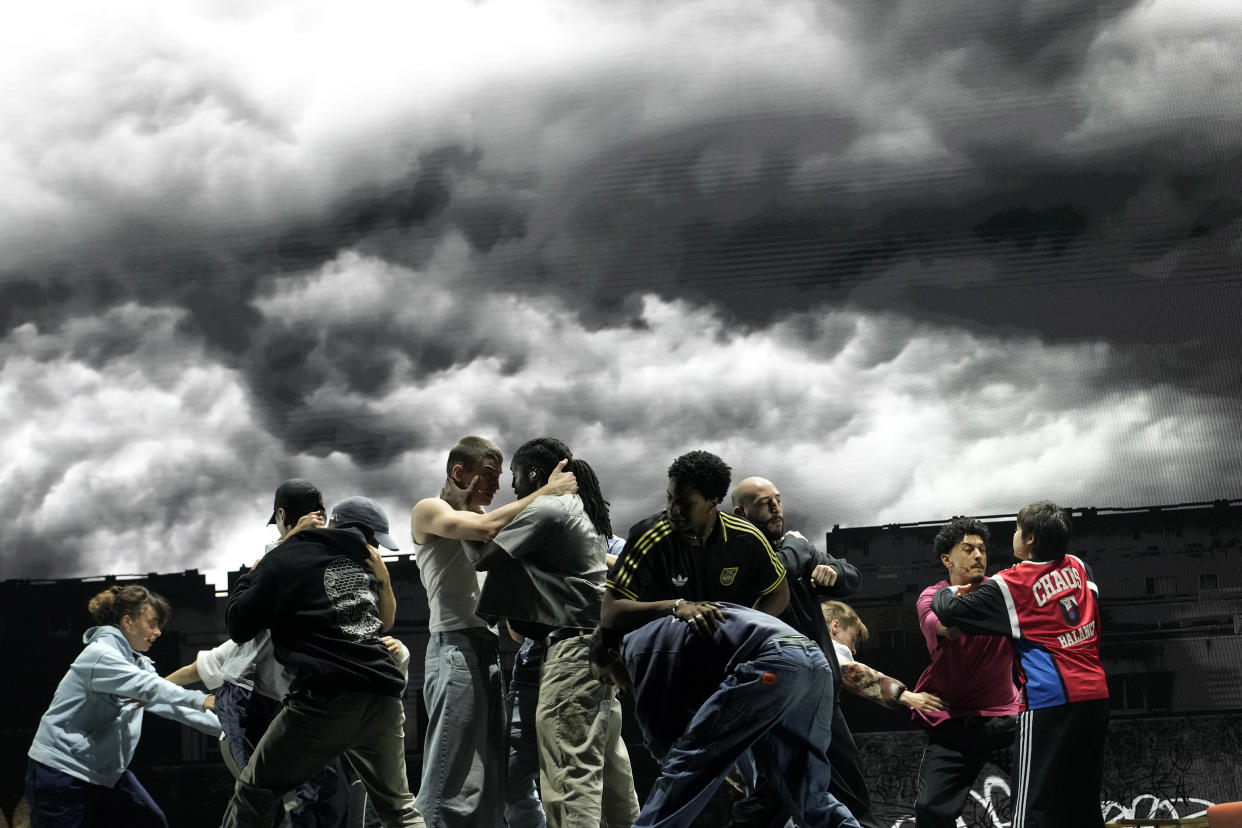 Actors perform during a rehearsal of La Haine musical show, in Tremblay en France, Tuesday, Sept. 17, 2024. (AP Photo/Christophe Ena)