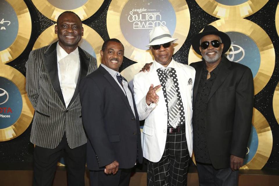 In this Nov. 7, 2014 file photo, George Brown, Ronald Bell, Dennis Thomas and Robert ‘Kool’ Bell of Kool & the Gang arrive during the 2014 Soul Train Awards at the Orleans Arena at The Orleans Hotel & Casino in Las Vegas, Nev. (Photo by Omar Vega/Invision/AP, File)