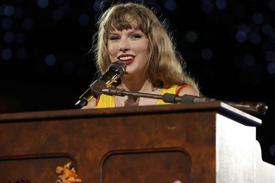 <p>Ashok Kumar/TAS24/Getty</p> Taylor Swift performs in Singapore on March 2, 2024