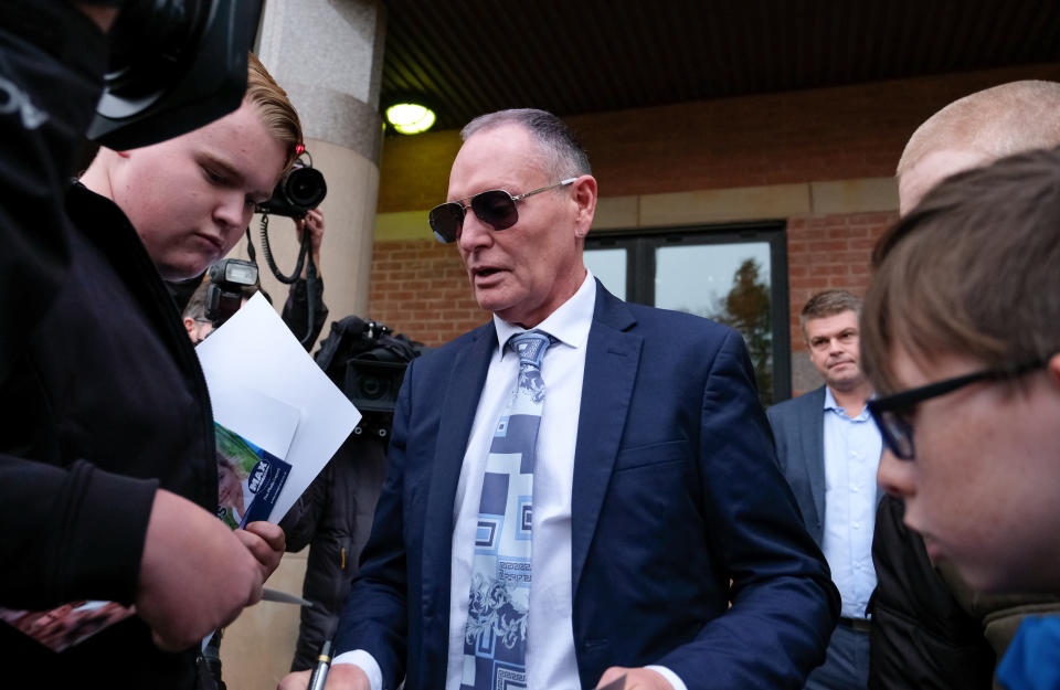 MIDDLESBROUGH, ENGLAND - OCTOBER 14: Former footballer Paul Gascoigne stops to sign autographs as he leaves Teesside Crown Court on October 14, 2019 in Middlesbrough, England. The former player is on trial for sexual assault after he was arrested for kissing a woman in August 2018 while travelling on a train between York and Newcastle. (Photo by Ian Forsyth/Getty Images)