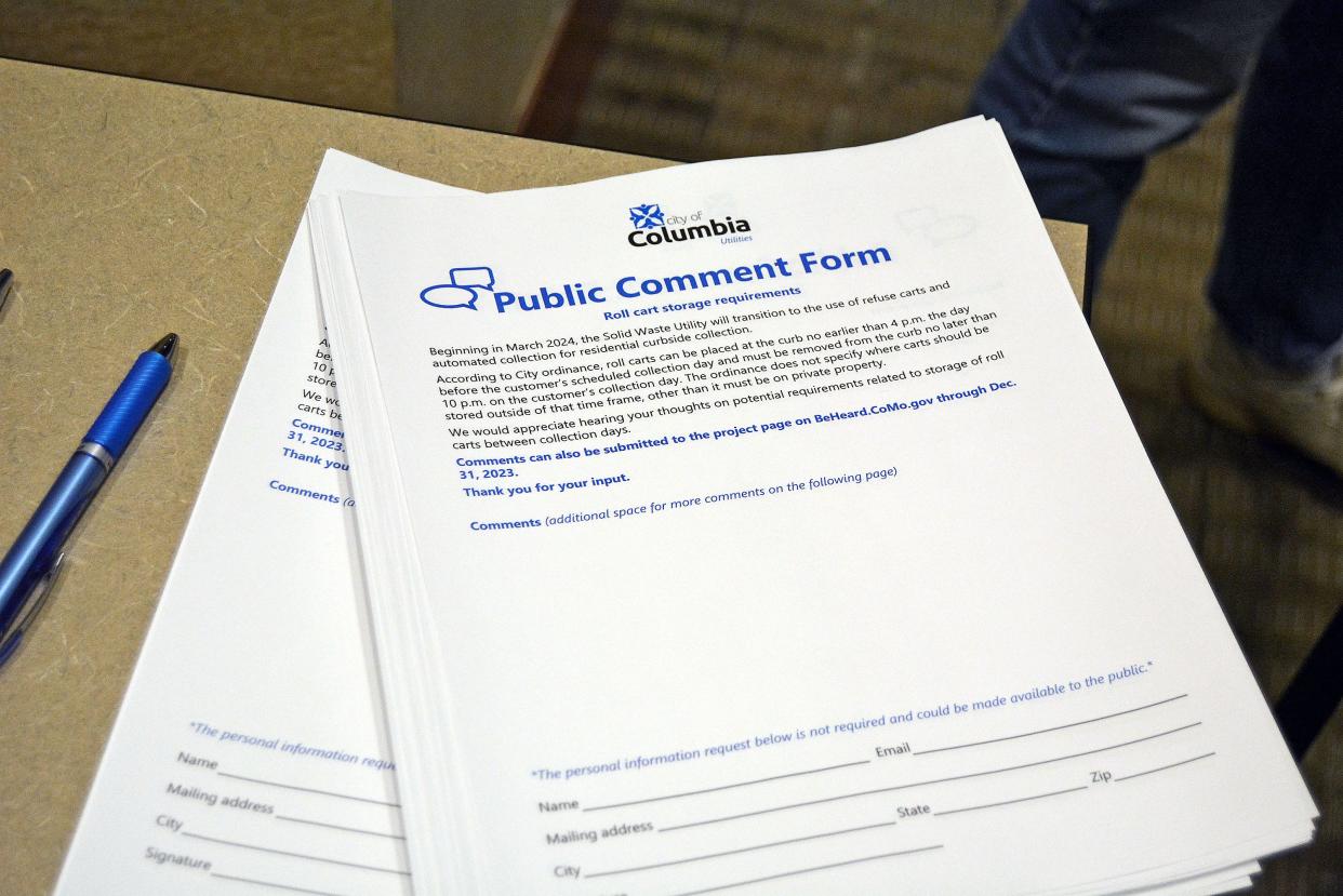 Comment forms sit on a conference room table Thursday at a meeting where public comments were sought an any updates to the city's trash roll cart storage ordinance.