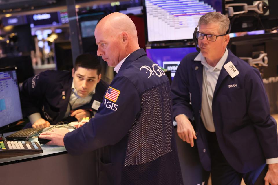 Traders work on the floor of the New York Stock Exchange during morning trading on March 15, 2023 in New York City.