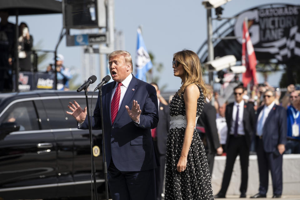 President Donald Trump, accompanied by first lady Melania Trump, gives the instructions "gentlemen, start your engines," before the start of the NASCAR Daytona 500 auto race at Daytona International Speedway, Sunday, Feb. 16, 2020, in Daytona Beach, Fla. (AP Photo/Alex Brandon)