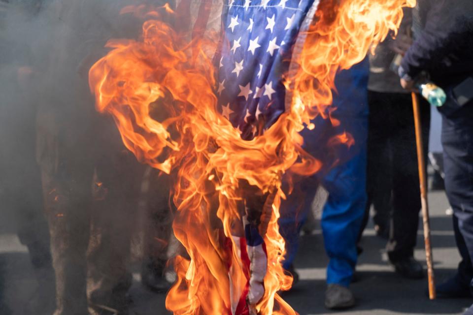 Those $%*#@# guys. Why can't we all unite around this common enemy instead of fighting each other politically at home? <em>Iranian protesters burn the U.S. flag during an anti-Israel rally protesting the Israeli air strike on Al-Ahli hospital, in northern Tehran, October 20, 2023. Israel's military denied responsibility for the Gaza hospital attack, attributing it to a failed rocket launch by the Palestinian Islamic Jihad group. MORTEZA NIKOUBAZL/NurPhoto (Photo by Morteza Nikoubazl/NurPhoto via Getty Images)</em>