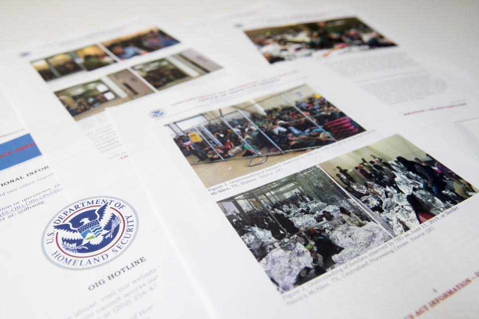 A portion of a report from government auditors reveals images of people penned into overcrowded Border Patrol facilities, photographed Tuesday, July 2, 2019, in Washington. The report released Tuesday by the Department of Homeland Security's Office of Inspector General warns that facilities in South Texas' Rio Grande Valley face "serious overcrowding" and require "immediate attention." (AP Photo/Andrew Harnik)