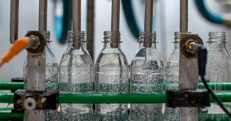 Detailed view of Ambev's hand sanitizer being bottled