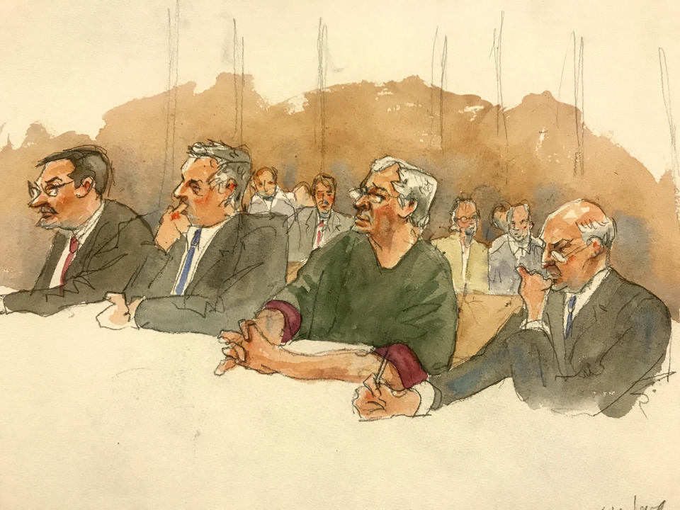 In this courtroom sketch, defendant Jeffrey Epstein, second from right, listens along with defense attorneys, from left, Marc Fernich, Michael Miller, and Martin Weinberg as Judge Richard M. Berman denies him bail during a hearing in federal court, Thursday, July 18, 2019 in New York. Judge Berman denied bail for the jailed financier on sex trafficking charges, saying the danger to the community that would result if the jet-setting defendant was free formed the "heart of this decision." (Aggie Kenny via AP)