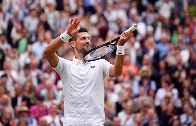 Novak Djokovic pretends to play his racket like a voilin