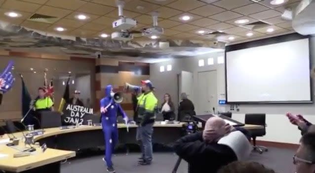 A group of activists have stormed a Melbourne council meeting. Photo: Facebook