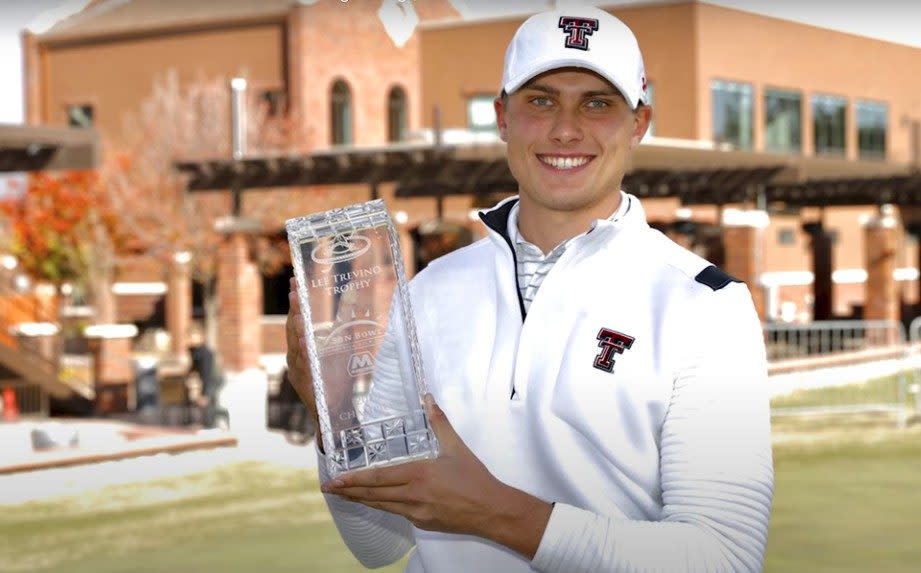 A picture of Ludvid Aberg in Texas Tech golf uniform holding a trophy