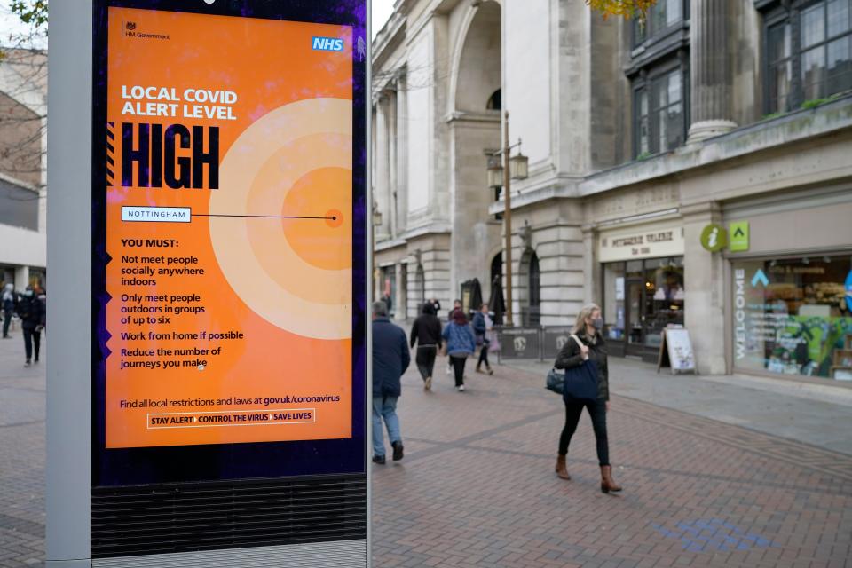 People walk through Nottingham City centre ahead of the implementation of Tier Three restrictions (Getty Images)