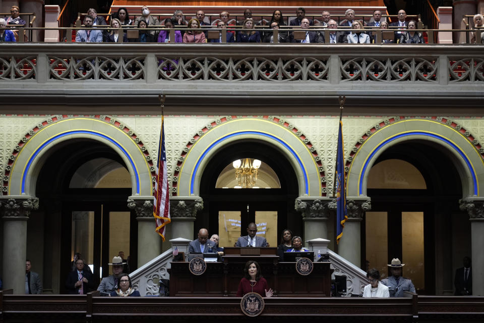 New York Governor Kathy Hochul, bottom center, speaks during the State of the State address in Albany, N.Y., Tuesday, Jan. 9, 2024. The Democrat outlined her agenda for the ongoing legislative session, focusing on crime, housing and education policies. (AP Photo/Seth Wenig)