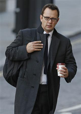 Former News of the World editor Andy Coulson arrives at the Old Bailey courthouse in London November 14, 2013. REUTERS/Olivia Harris