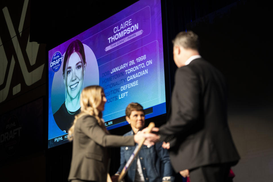 Minnesota's first pick Claire Thompson's image is displayed as she was not present as she was drafted in the first round during the PWHL hockey draft n St. Paul, Minn., Monday June, 10, 2024. (Renee Jones/Star Tribune via AP)