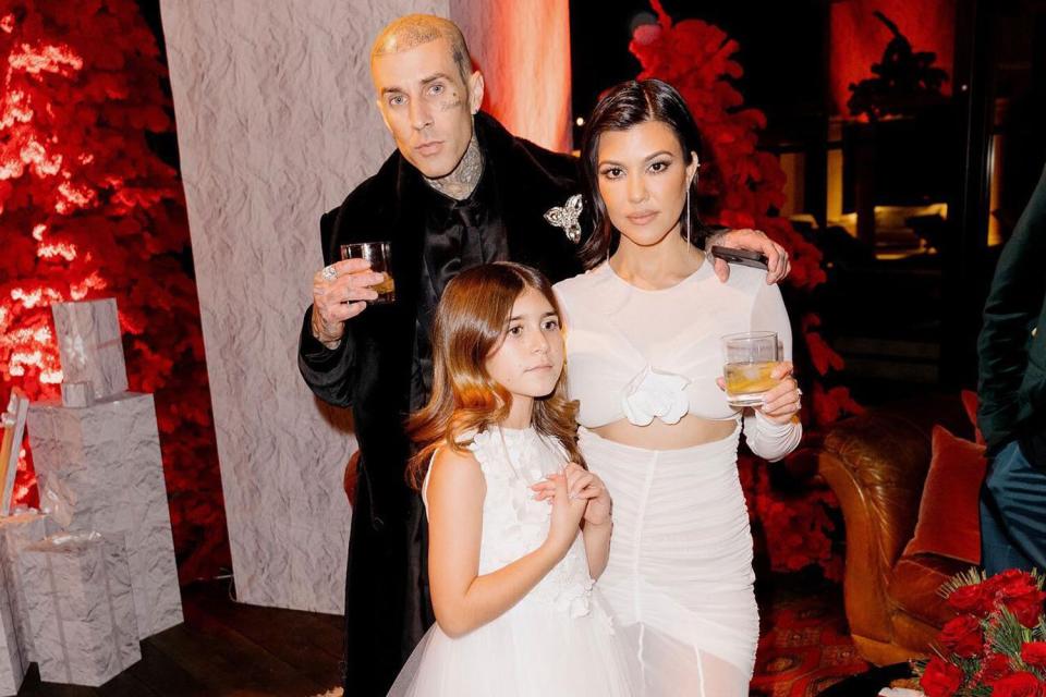 Kourtney Kardashian Dazzles at the Kardashian Christmas Eve Party with Her and Husband Travis Barker&#39;s Kids https://www.instagram.com/p/Cmu147Zvmvk/?igshid=MWI4MTIyMDE%3D