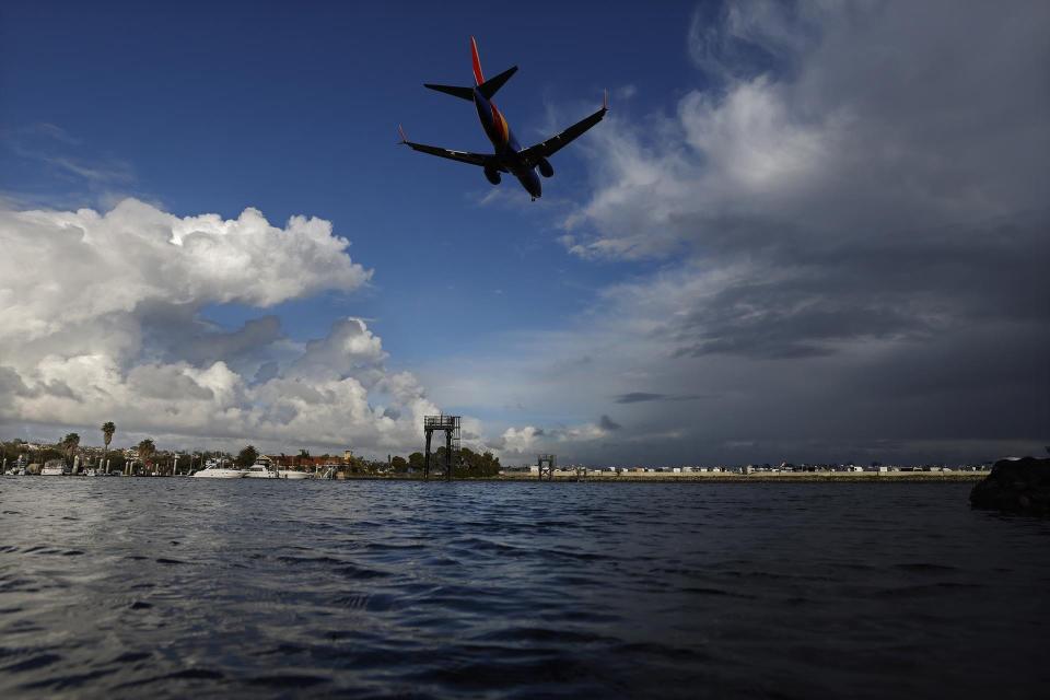 Image of Southwest plane landing at San Diego airport.