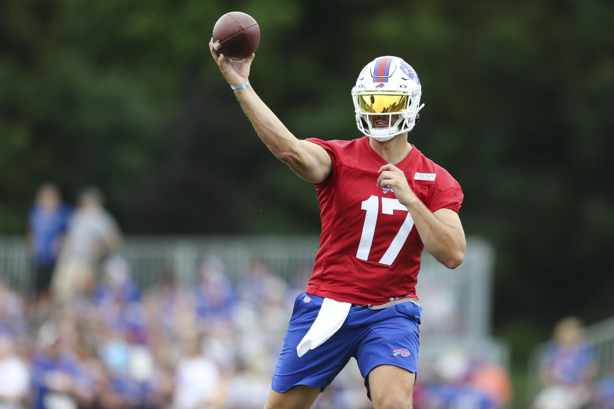 Buffalo Bills quarterback Josh Allen (17) gets set to hick the