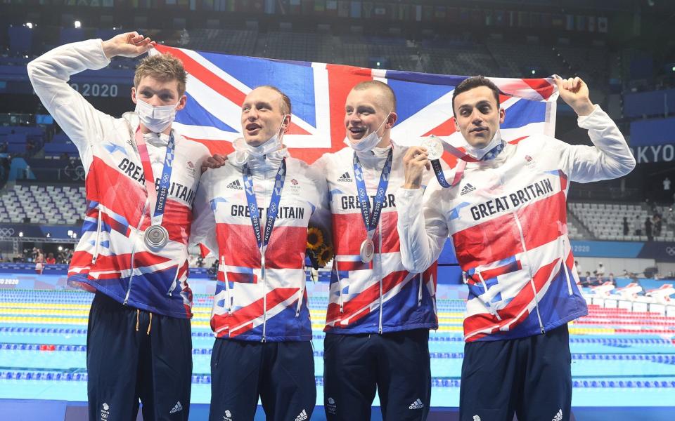 Duncan Scott, Luke Greenbank, Adam Peaty and James Guy pose with their silver medals from the Men's 4x100m Medley Relay on day nine of the Tokyo 2020 Olympic Games at Tokyo Aquatics Centre on August 01, 2021 in Tokyo, Japan. - GETTY IMAGES