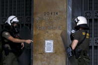 Greek riot police officers take position in front of the Bank of Greece during demonstrations in Athens, Greece, June 30, 2015. REUTERS/Yannis Behrakis