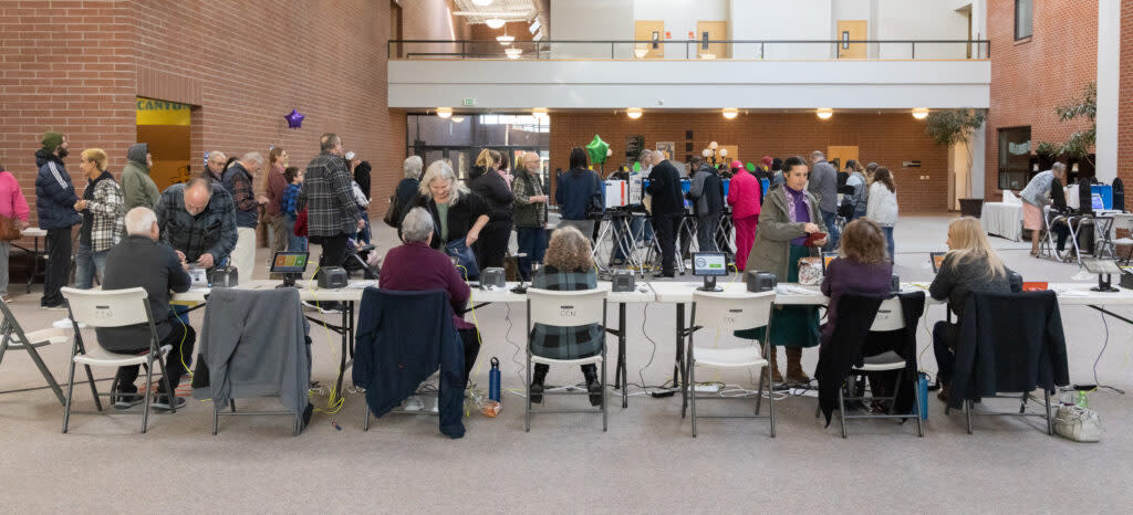 Voters fill out their ballots at a polling place at the College Church of the Nazarene on the NNU campus in Nampa, Idaho,