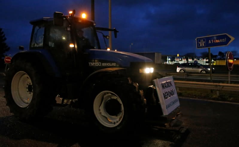 French farmers drive on the A1 Lille-Paris motorway during a protest near Vemars