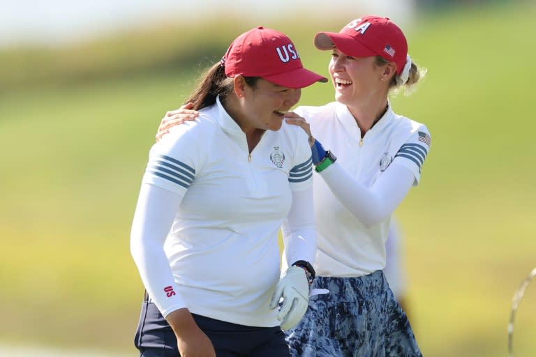 Top seeds Nelly Korda (right) and Allisen Corpuz celebrate an eagle putt by Korda as the US duo teamed up to win a foursome match at the Solheim Cup (Gregory Shamus)