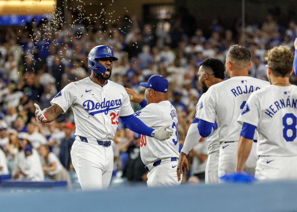 Jason Heyward is showered with sunflower seeds in the dugout.