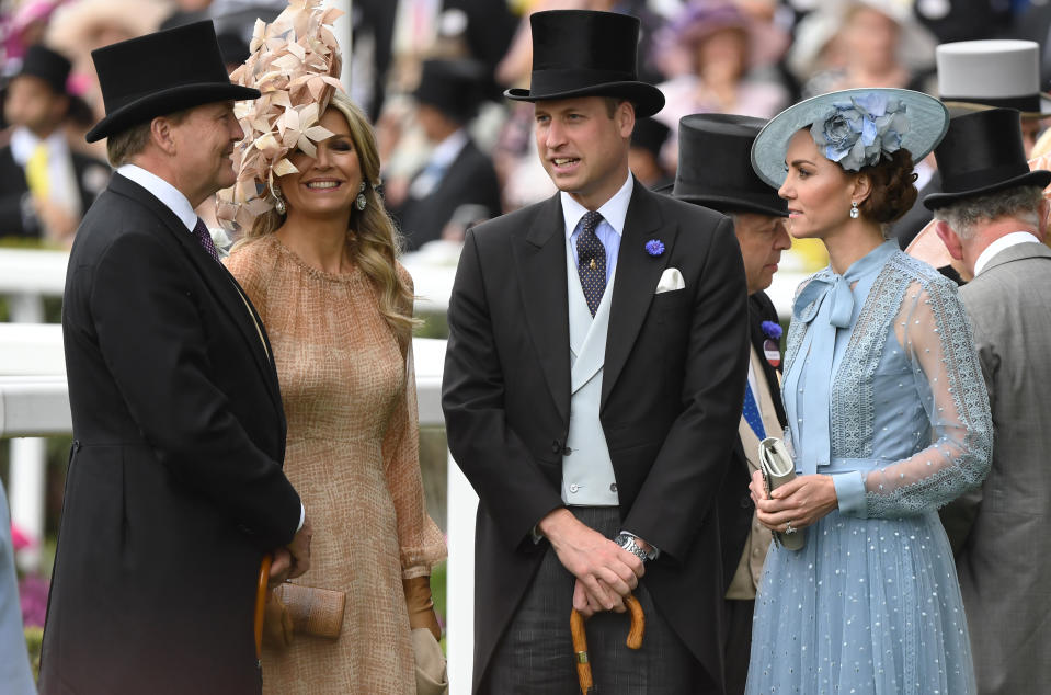 ASCOT,  UNITED KINGDOM - JUNE 18:  Prince William, Duke of Cambridge and Catherine, Duchess of Cambridge chat to King Willem-Alexander of the Netherlands and Queen Maxima of the Netherlands during day one of Royal Ascot on June 18, 2019 in Ascot, England. (Photo by Anwar Hussein/WireImage)